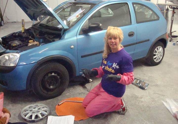 Lisa Bailies Auto Refinishers Changing Tyre